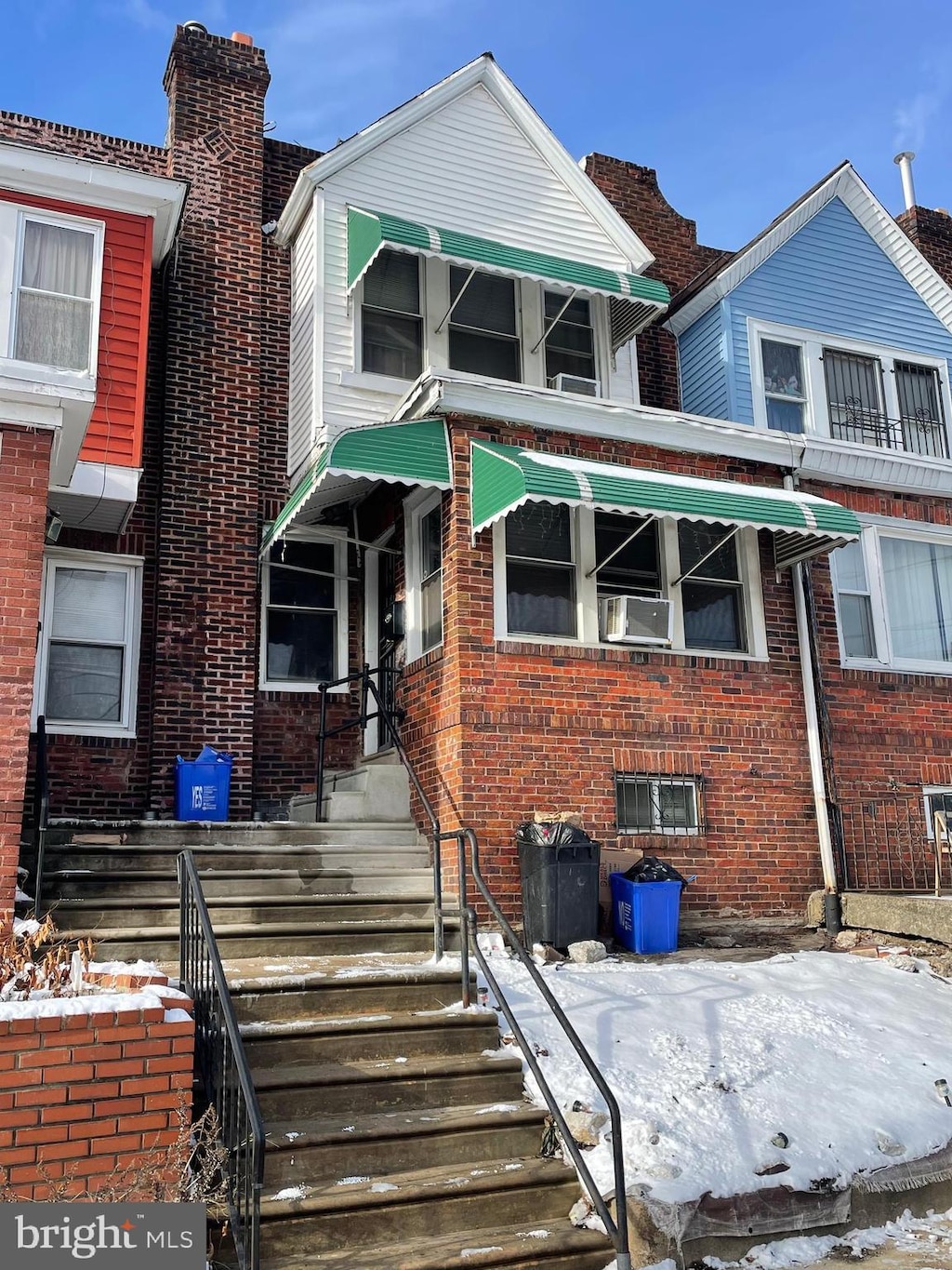 view of front of home featuring cooling unit