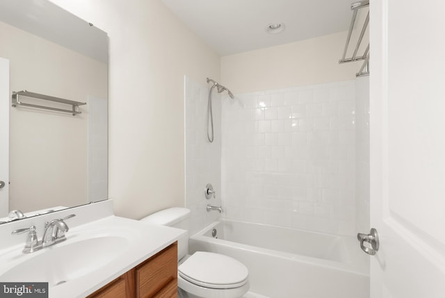 bathroom featuring shower / tub combination, vanity, and toilet