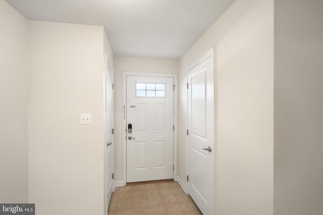 doorway with light floors