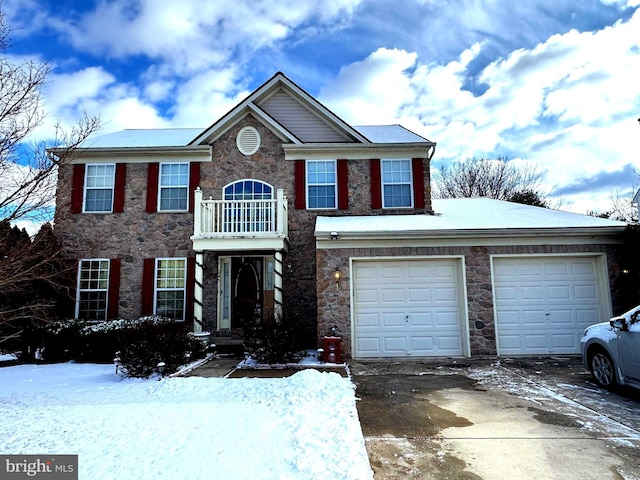 view of front of home featuring a balcony