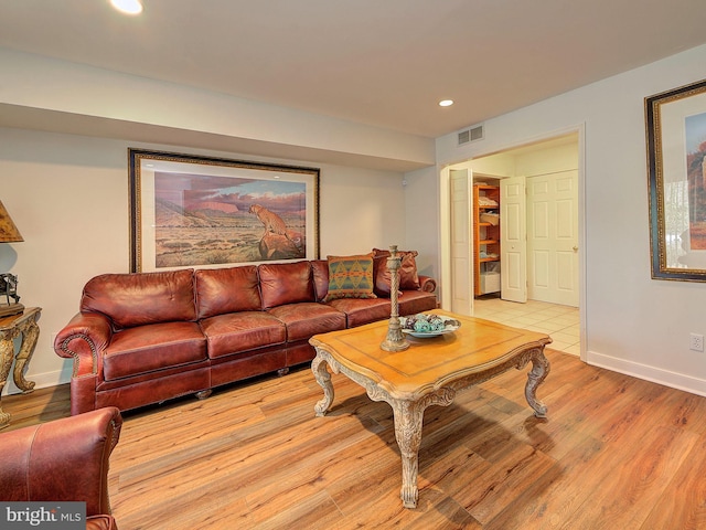 living room with light hardwood / wood-style floors