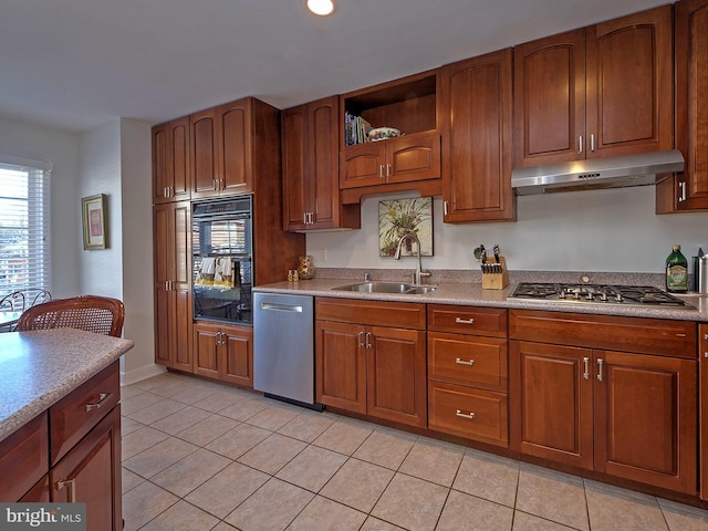 kitchen with light tile patterned floors, sink, and appliances with stainless steel finishes