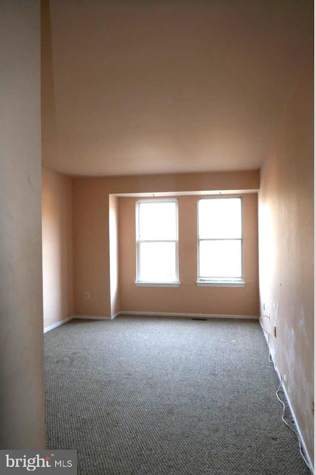 unfurnished room with carpet