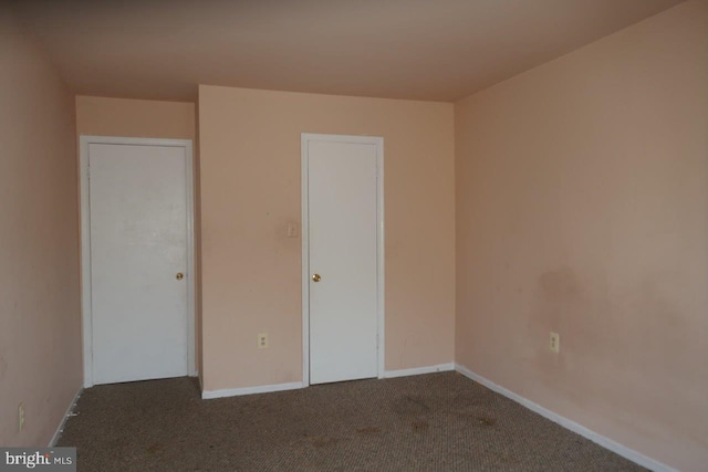 unfurnished bedroom featuring carpet floors