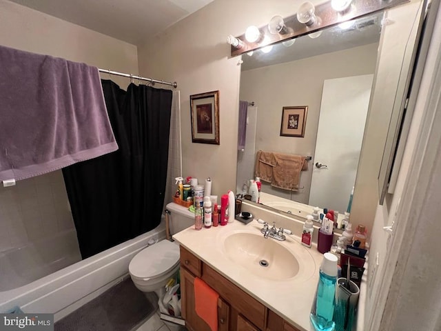 full bathroom with tile patterned flooring, vanity, shower / tub combo with curtain, and toilet