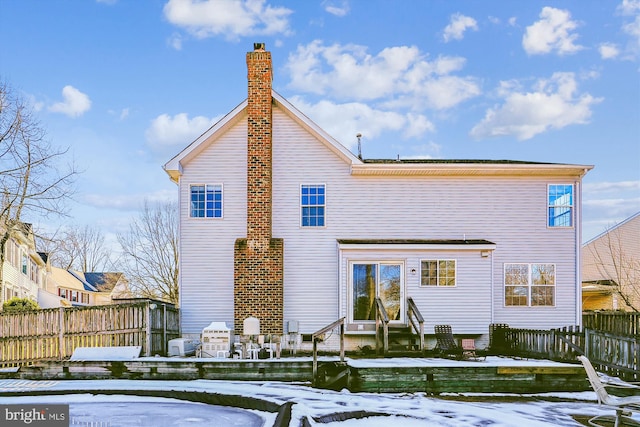 view of snow covered property