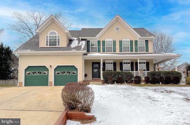 view of front of property featuring a porch and a garage