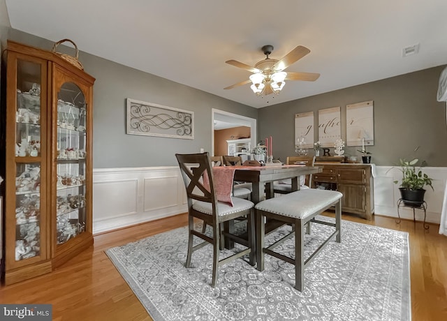 dining area featuring light hardwood / wood-style floors and ceiling fan