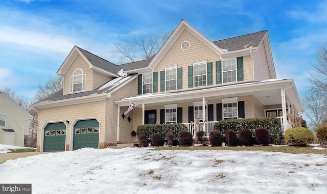 front of property with a garage and a porch