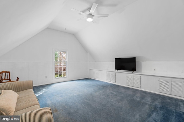 interior space featuring carpet floors, vaulted ceiling, and ceiling fan