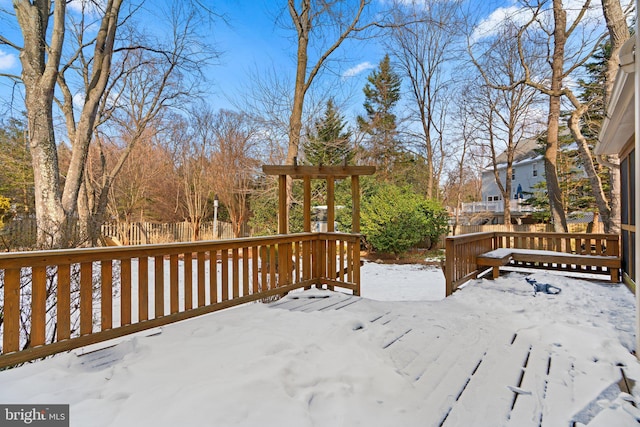 view of snow covered deck