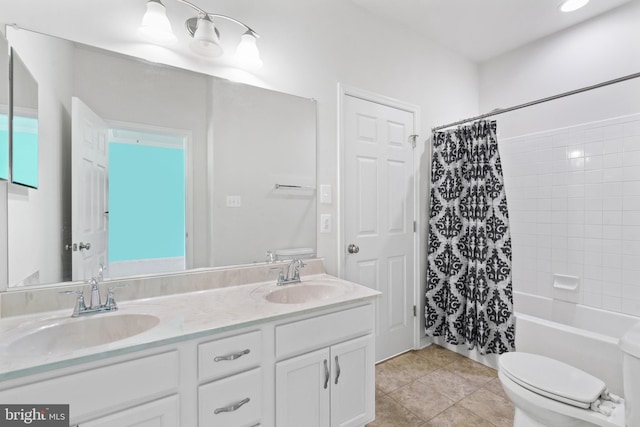 full bathroom with toilet, tile patterned flooring, shower / bathtub combination with curtain, and vanity