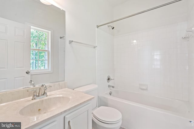 full bathroom featuring toilet, vanity, and  shower combination