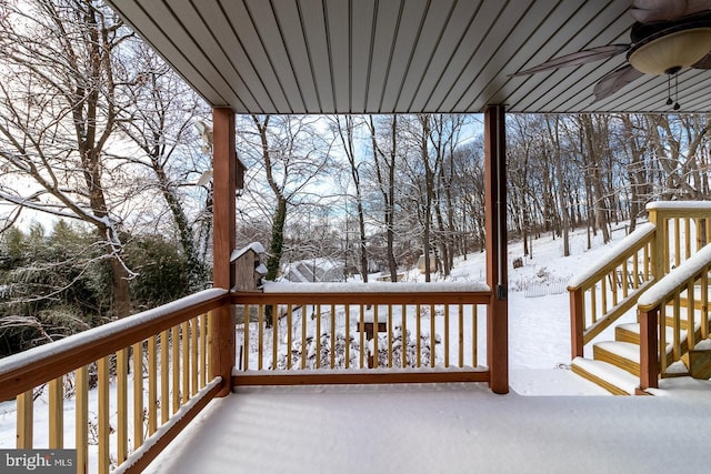 snow covered deck with ceiling fan