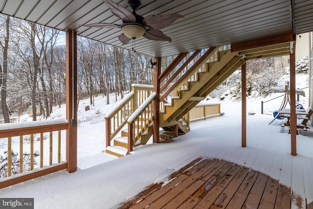 snow covered deck with ceiling fan