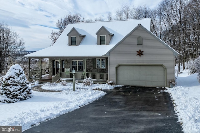 view of front of property with a porch and a garage