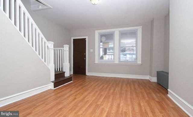 entrance foyer with light wood-type flooring