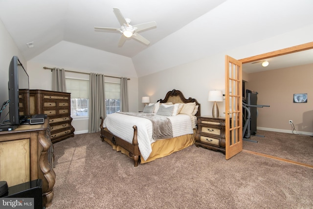 bedroom with ceiling fan, lofted ceiling, and carpet flooring