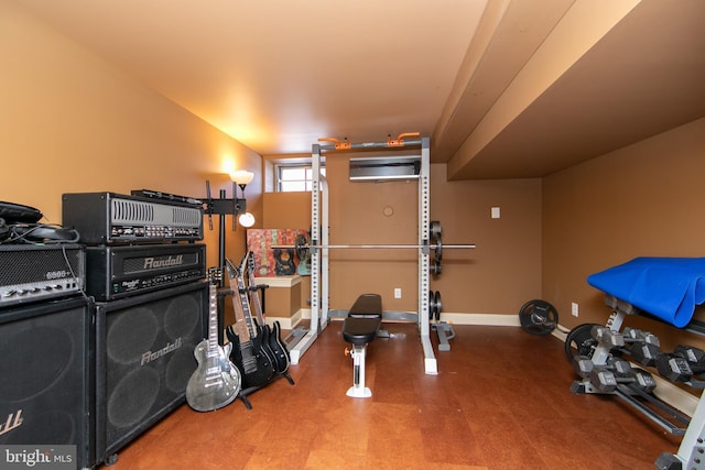 workout room with an AC wall unit