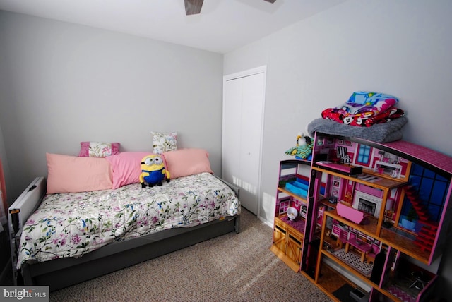 bedroom featuring baseboard heating, carpet floors, and ceiling fan