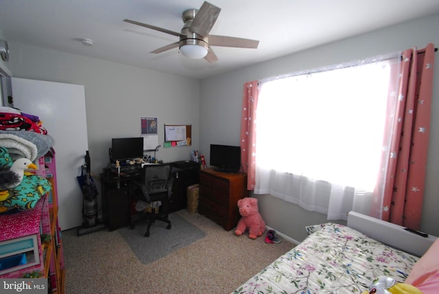 bedroom with ceiling fan and light colored carpet