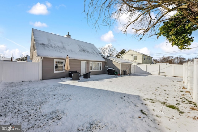 view of snow covered property