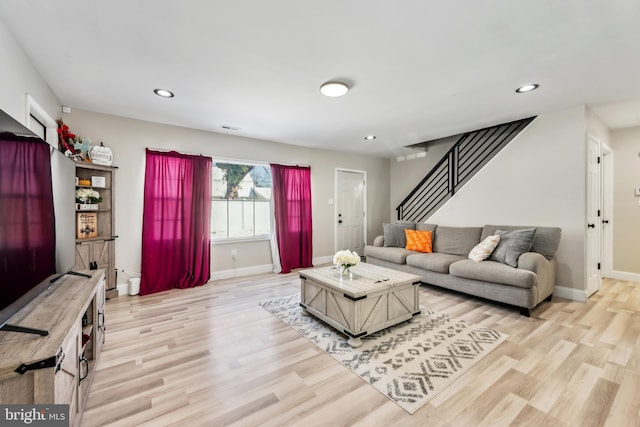 living room featuring light wood-type flooring