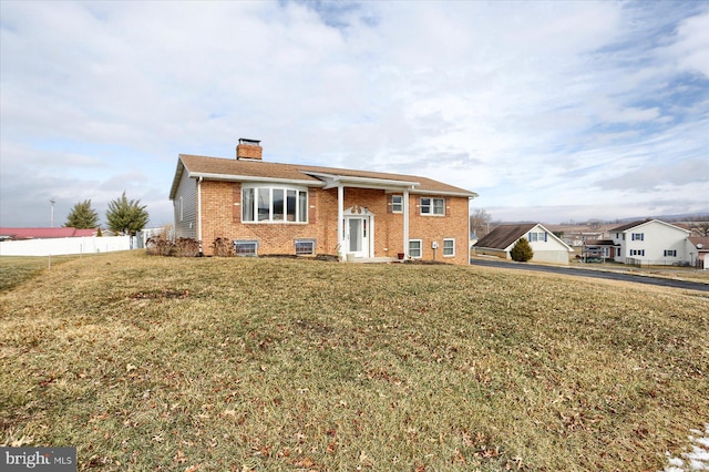 view of front facade with a front lawn