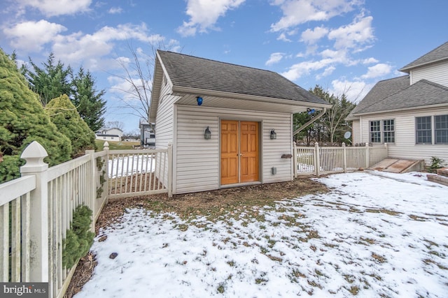 view of snow covered house