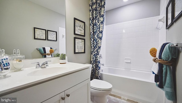 full bathroom with toilet, vanity, and shower / tub combo with curtain