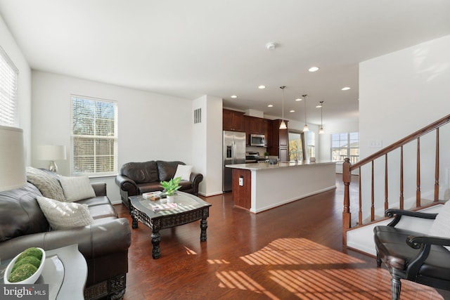 living room with dark wood-type flooring