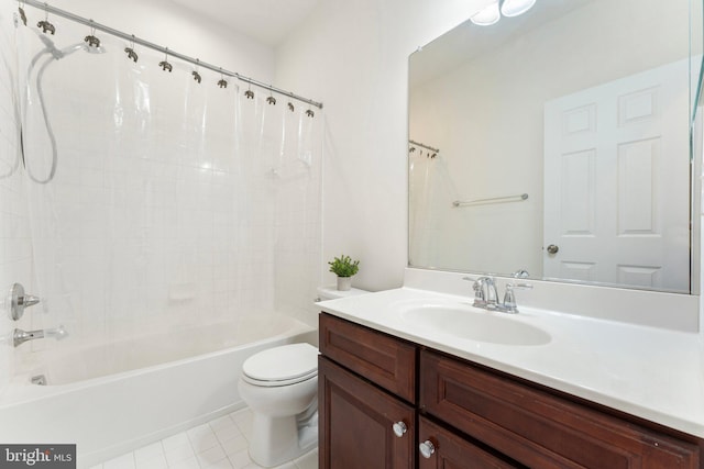 full bathroom featuring toilet, tile patterned flooring, vanity, and shower / tub combo with curtain