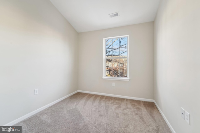 empty room with carpet flooring