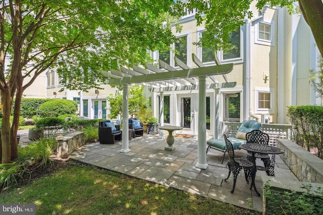 view of patio / terrace featuring an outdoor living space and a pergola