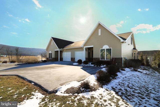 148 Gemstone Dr, Bellefonte, PA 16823 - view of front of home featuring driveway and an attached garage