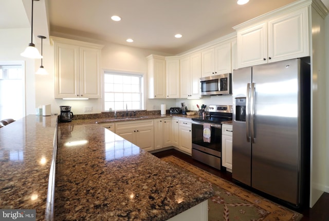 148 Gemstone Dr, Bellefonte, PA 16823 - kitchen featuring a sink, white cabinetry, recessed lighting, and appliances with stainless steel finishes