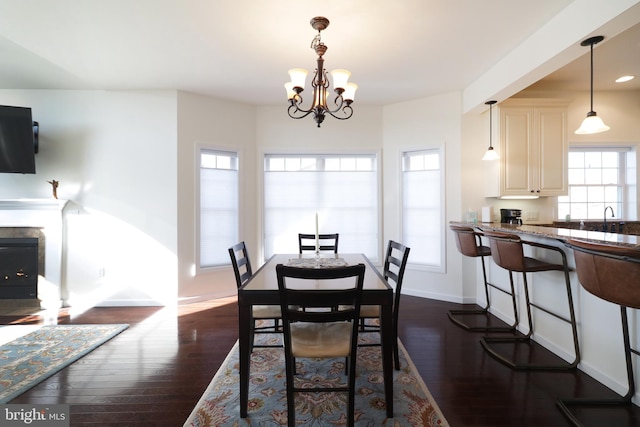 148 Gemstone Dr, Bellefonte, PA 16823 - dining room featuring baseboards, a notable chandelier, recessed lighting, and dark wood-type flooring