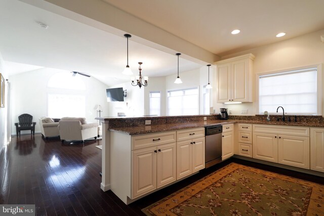 148 Gemstone Dr, Bellefonte, PA 16823 - kitchen with dark wood-type flooring, a chandelier, a sink, dishwasher, and a peninsula