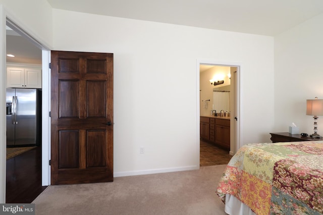 148 Gemstone Dr, Bellefonte, PA 16823 - bedroom with stainless steel fridge with ice dispenser, ensuite bath, baseboards, and light carpet