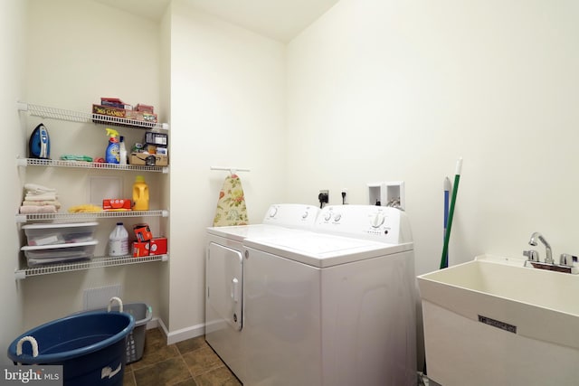 148 Gemstone Dr, Bellefonte, PA 16823 - laundry area with washing machine and dryer, a sink, laundry area, baseboards, and dark tile patterned flooring