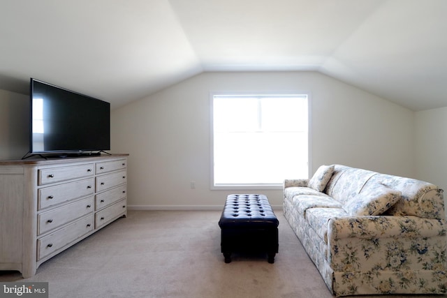 148 Gemstone Dr, Bellefonte, PA 16823 - living area with light colored carpet, lofted ceiling, and baseboards