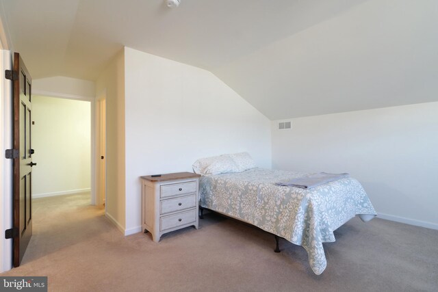 148 Gemstone Dr, Bellefonte, PA 16823 - bedroom with light carpet, visible vents, and lofted ceiling