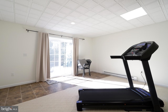 148 Gemstone Dr, Bellefonte, PA 16823 - workout room featuring tile patterned floors, baseboards, and a baseboard heating unit