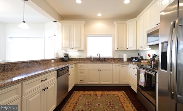 148 Gemstone Dr, Bellefonte, PA 16823 - kitchen featuring a sink, pendant lighting, dark stone countertops, stainless steel appliances, and recessed lighting