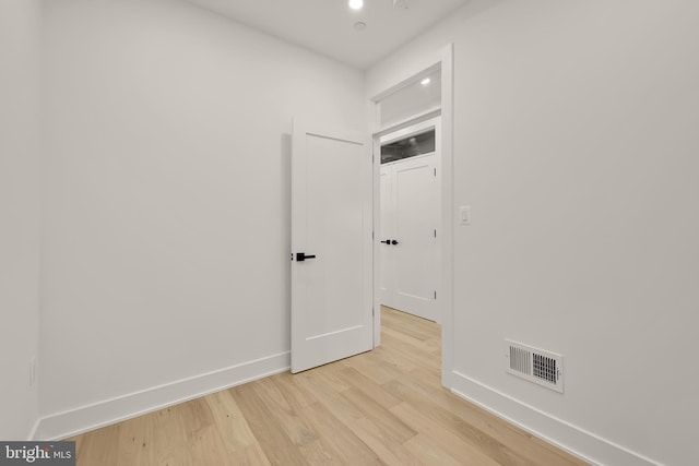 spare room with light wood-type flooring