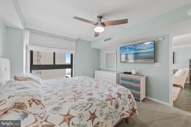 bedroom featuring ceiling fan and carpet floors