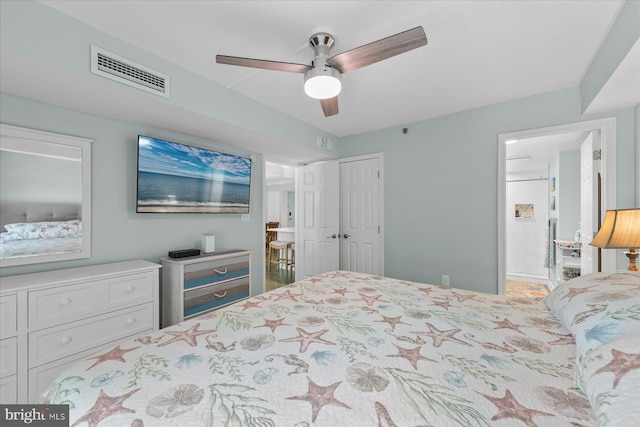 bedroom with connected bathroom and ceiling fan