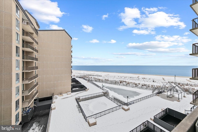 view of water feature with a beach view