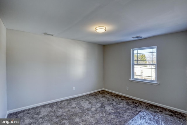 view of carpeted spare room