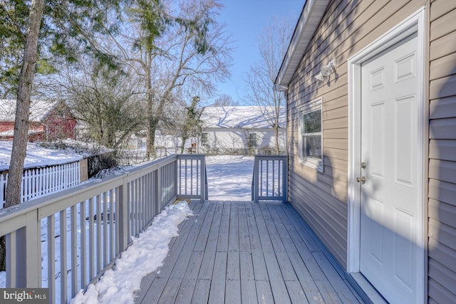 view of snow covered deck